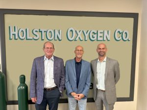 Holston Gases CEO Robert Anders, Chairman of the Board Bill Baxter, and President Joe Baxter